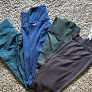 4 pairs Fabletics Leggings in Teal, Navy, green and Charcoal